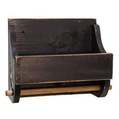 an old wooden bench with wheels on the bottom and one section holding a wine bottle