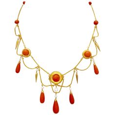 Very elegant and delicate necklace made out of 18 karat gold around 1870 in the neo archeological style. Fine fox tail chains alternate with coral beads and round gold disks reminiscent of targets. The disks, the larger one as centrepiece of the necklace and two smaler ones to either side are decorated with large coral boutons. More fox tail chains are suspended like garlands from the top row of gold chains. Every point of connection is accentuated by an articulated orient pearl with either a go Antique Yellow Gold Necklace With Historical Design, Antique Yellow Gold Necklace With Cabochon, Traditional Cabochon Necklace For Formal Occasions, Traditional Formal Cabochon Necklace, Gold Art Nouveau Necklace For Formal Occasions, Gold Art Nouveau Necklaces For Formal Occasions, Art Nouveau Gold Necklace For Formal Occasions, Formal Art Nouveau Gold Necklace, Traditional Gold Cabochon Necklaces