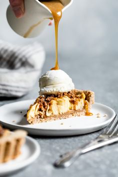 someone is pouring caramel sauce on a piece of pie