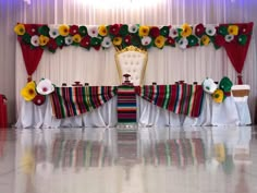 a banquet table set up with colorful decorations