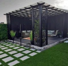 an outdoor living area is shown with grass