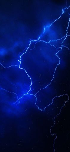 the sky is filled with bright blue lightning