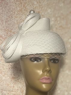 Elegant white hat for all occasions half hat fascinator: church, weddings, funeral. The hat is trimmed with bows, a hat pin and net veiling. HAT MEASUREMENTS  Diameter : 8 inches  SHIPPING  All items shipped for free will be shipped via USPS FIRST CLASS MAIL. Gifts for mom, sister, wife, or yourself. White Fitted Boater Hat With Short Brim, Classic White Top Hat For Kentucky Derby, Classic White Fascinator, Classic White Mini Hat With Short Brim, White Structured Crown Hat For Kentucky Derby, Fitted White Cloche Costume Hat, White Fitted Cloche Hat For Kentucky Derby, Classic White Top Hat For Formal Occasions, White Fitted Cloche Costume Hat