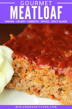 meatloaf on a plate with a white flower in the foreground and text overlay that reads gourmet meatloaf