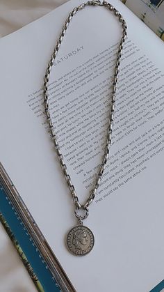 "This Silver Rome coin necklace is simple yet with a twist. The beautiful necklace is full of presence and suitable for any occasion. *If you have a specific sizing request, please drop me a message Details: ◇ Length is available in 5 sizes: 41cm (16\"), 43cm (17\"), 46cm (18\"), 48cm (19\"), and 51cm (20\") ◇ Width of the chain: 3mm (0.12\") ◇ Medallion measurements: 25mm (1\") x 25mm (1\") ◇ The piece is made of 925 Sterling silver over brass ◇ All items shipped in a jewelry gift box ENTER OUR Coin Pendant Necklace, Medallion Necklace, Coin Necklace, Beautiful Necklace, Coin Pendant, Jewelry Gift Box, Men Necklace, Jewelry Gift, Beautiful Necklaces