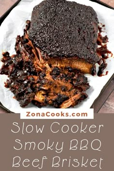 slow cooker smoky bbq beef brisket on a plate with text overlay