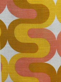 an orange and yellow pattern on fabric