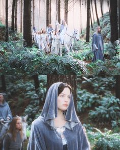 a woman dressed in medieval clothing standing next to a group of people riding horses through a forest