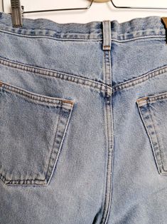 "Vintage 90's retro Calvin Klein Jeans denim shorts, they have been cropped. Zipper and button fly. Very good vintage condition, a couple of faded marks and over-all fade, perfect for a relaxed 90's look. They would fit waist 33\" - 34\". Size tag reads 34. Please read the measurements below very carefully and compare to one of your own garments, to avoid any disappointment regarding the fit. Item is measured flat: - waist: 42 cm; - front rise: 32 cm ; - length (waist to hem): 58 cm. All our ite Retro Short Denim Blue Jeans, Retro Cutoff Medium Wash Jeans, Retro Medium Wash Cutoff Jeans, Retro Straight Leg Jean Shorts With Pockets, Light Wash Straight Leg Jean Shorts, Faded Straight Leg Denim Jean Shorts, Retro Medium Wash Jean Shorts, Retro Blue Cutoff Jeans, Retro Light Wash Short Jeans