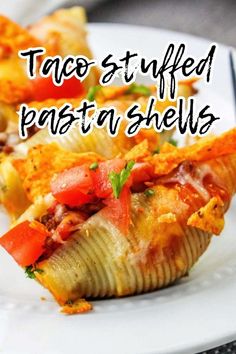 taco stuffed pasta shells on a white plate