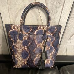 Hello Poshers! This Listing Is For A New Wt Kate Spade Blue Snakeskin Madison Collection Tote Bag. This Bag Was Purchased For Me As A Gift At A Sample Sale But Never Worn. I Love The Bag But I Have Way Too Many Lol. This Bag Is Unique, One Of A Kind, And Not Sold In Stores. Make Me An Offer Happy Poshing! Chic Blue Bags With Leather Handles, Kate Spade Leather Shoulder Bag With Handle Drop, Blue Luxury Bag For On-the-go, Chic Blue Handheld Satchel, Blue Leather Handheld Shoulder Bag, Evening Blue Shoulder Bag With Leather Handles, Kate Spade Handheld Leather Shoulder Bag, Kate Spade Leather Shoulder Bag With Handles, Kate Spade Leather Shoulder Bag