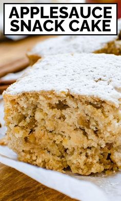 a close up of a piece of cake on a plate with the words applesauce snack cake