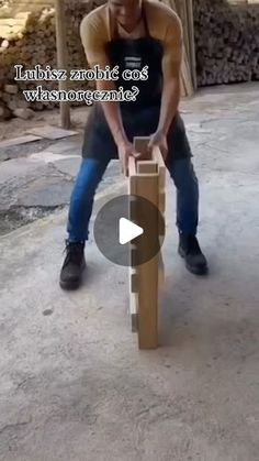 a man is playing with some kind of wooden object in front of the camera and text that reads, ladyy zabble cos whanore?