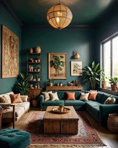 a living room filled with lots of green furniture and paintings on the wall above it