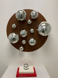 Silver plated glass wall spheres