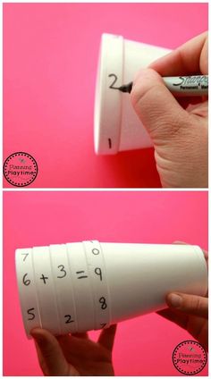 a person is writing numbers on a plastic tube