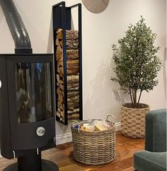 a living room filled with furniture and a clock on the wall above it's fireplace