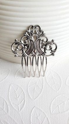 Vintage Style Haircomb This Vintage Style haircomb is Silver and it is captivating and Beautiful. This comb can be used for special occasions like weddings, or for any everyday occasion.  ☻Link to More Hair Accessories: https://www.etsy.com/shop/FashionCrashJewelry?ref=profile_header&search_query=hair+accessories ☻Link to The ENTIRE SHOP: https://www.etsy.com/shop/FashionCrashJewelry?ref=shopsection_shophome_leftnav&ga_search_query=crystal%2Bnecklace Our Motto ~ Happy Customers Are Awesome Let u Gothic Oc, Vintage Accessories Jewelry, Goddess Hair, Wedding Bun, Bun Holder, Gothic Hairstyles, Positive Comments, Goddess Hairstyles, Aesthetic Jewelry