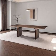 a large wooden table sitting on top of a white rug