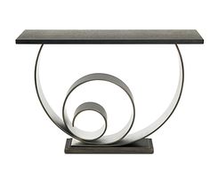 a metal table with three circles on it's base and a black marble top