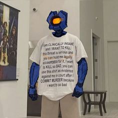 a t - shirt that has been made to look like a robot with words on it