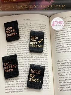 three harry potter bookmarks on top of an open book with the words one more page