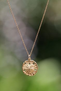 Gold sand dollar necklace  delicate necklace  a dainty by BubuRuby Beach Jewelry Aesthetic, Sand Dollar Necklace, Ruby Rings, Beach Necklace, Gold Sand, Beach Necklaces