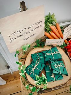 carrots and other vegetables on a wooden table