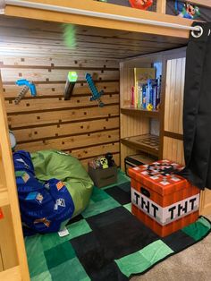 a bedroom with a loft bed and toys on the floor