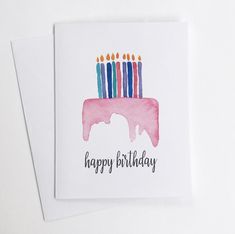 a birthday card with candles on top of a cake