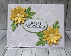 a birthday card with yellow flowers on it