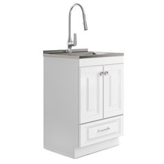 a white sink and cabinet with a faucet on the left side, in front of a white background