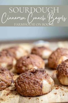 some cinnamon crunch bagels are on a cutting board with the words, sourdough cinnamon crunch bags