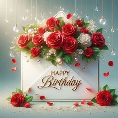 a happy birthday card with red roses in an envelope