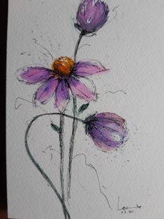 a drawing of two purple flowers on a white paper with watercolor pencils in it