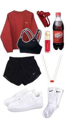 the contents of a woman's outfit including sneakers, water bottle and socks