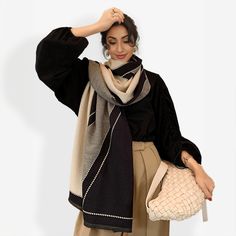 Our Classic Shawl is a must-have for stylish individuals looking to make a statement. This elegant shawl is artfully crafted from a sublime blend of organic fabrics for supreme softness and comfort. Its timeless design is an ode to modern sophistication while honoring classic fashion sensibilities. Use it to elevate a simple outfit or wrap it around you on those cooler days for warmth and style. Chic Beige Shawl For Fall, Classic Beige Scarf For Fall, Classic Beige Scarves For Fall, Chic Beige Scarf For Fall, Chic Beige Scarves For Fall, Chic Beige Winter Shawl, Chic Beige Fall Scarves, Elegant Cream Scarves For Fall, Elegant Fall Pashmina Shawl