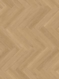 an image of wood flooring that looks like it is herringbones or chevroned