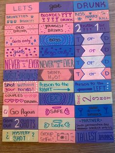 several pieces of paper that have different words on them, all in pink and blue