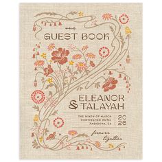 a wedding guest book with flowers and vines on the front, in beige linen cover