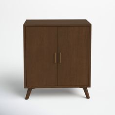 a wooden cabinet with two doors and legs