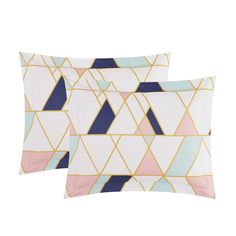 two pillows with geometric designs on them, one is blue and the other is pink