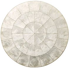 a white marble plate with circular design on it