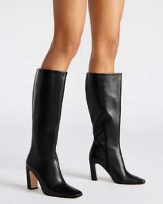 Expertly constructed, the LIZETTE boot is designed with a sleek knee-high silhouette, square toe, and stylish heel. This boot is durable and fashionable, making it the perfect addition to any wardrobe. Elevate your look with these timeless boots. 3.5 inch heel height Size 6 measurements: 14.5 inch shaft circumference, 14 inch shaft height Size 8 measurements: 16 inch shaft circumference, 14.5 inch shaft height Size 10 measurements: 16.75 inch shaft circumference, 15 inch shaft height Leather upp Black Tall Boots Outfit, Black Boot Heels, Tall Boots Outfit, Timeless Boots, Tall Black Boots, Black Leather Knee High Boots, Stylish Heels, Black Boots Tall, Square Toe Boots