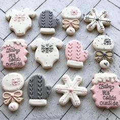 some decorated cookies are laying on the floor