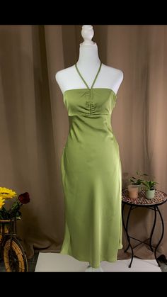 Midi dress Halter neck tie fastening Zipper fastening on the side 97% polyester 3% spandex Model is wearing a size small Color- green Green Knee-length Dress For Brunch, Light Green Fitted Dress For Brunch, Fitted Green Dress For Brunch, Fitted Green Dresses For Brunch, Summer Fitted Light Green Maxi Dress, Light Green Summer Dress For Brunch, Fitted Light Green Maxi Dress For Summer, Light Green Spring Dress For Brunch, Green Fitted Maxi Dress For Brunch