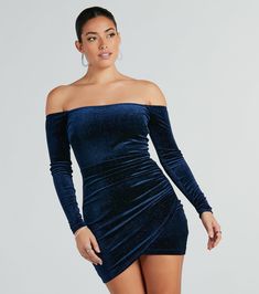 This glitter velvet mini dress is the perfect touch of sparkle for the party season! Featuring a figure-enhancing bodycon fit and off-the-shoulder design with fitted long sleeves, you'll make a glamorous statement while the side ruched seam and wrap mini-length hem add extra flair. Complete the look in platform heels for a holiday party!Fit & FeaturesOff-the-shoulder, fitted long sleevesBodycon fit, side ruched seamWrap mini-length hemGlitter velvet fabric, moderate stretchRuns true to size Glamorous Fitted Long Sleeve Off Shoulder Dress, Glamorous Velvet Bodycon Dress For Night Out, Off-shoulder Velvet Party Dress, Winter Party Fitted Off Shoulder Dress, Winter Party Off Shoulder Fitted Dress, Fitted Off Shoulder Dress For Winter Parties, Glamorous Off-shoulder Bodycon Mini Dress, Long Sleeve Glitter Mini Dress For Date Night, Long Sleeve Velvet Dress For Party Season Night Out