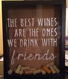 a framed sign with wine corks in it that says the best wines are the ones we drink with friends