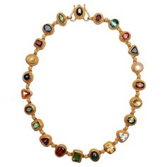 This multi -gemstone necklace by Santa Fe designer, Luna Felix is both arty and elegant. The twenty two links are a combination of round; oval; rectangular and triangular shapes. Among the stones are: moonstone; amethyst; garnet; citrine; aquamarine and various shades of tourmaline. Some stones are faceted; others are cabochon. Each is set with the Etruscan work gold beading characteristic of Felix's work. Her gold detailing is extraordinary. The necklace is 17 inches long and half an inch wide. Felix Bulgari, Hand Jewelry Rings, Dope Jewelry Accessories, Multi Gemstone Necklace, Stone Jewellery, Colorful Necklace, Twenty Two, Gem Necklace, Dope Jewelry