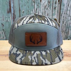 Deer Antlers Leather Patch 7 Panel Trucker Hat Bottomland/Loden Patch is hand stitched to hat. Awesome custom camo color on a top quality Richardson hat!  Stand out from the crowd. Richardson 168 brand hat If you would like a different color 7 panel hat just message us! Country Hats Men, Bottomland Camo, Cowboys Hats, Hunting Hats, Rodeo Gifts, Cowboy Wall Art, Richardson Hats, Western Wallpaper, Country Bumpkin